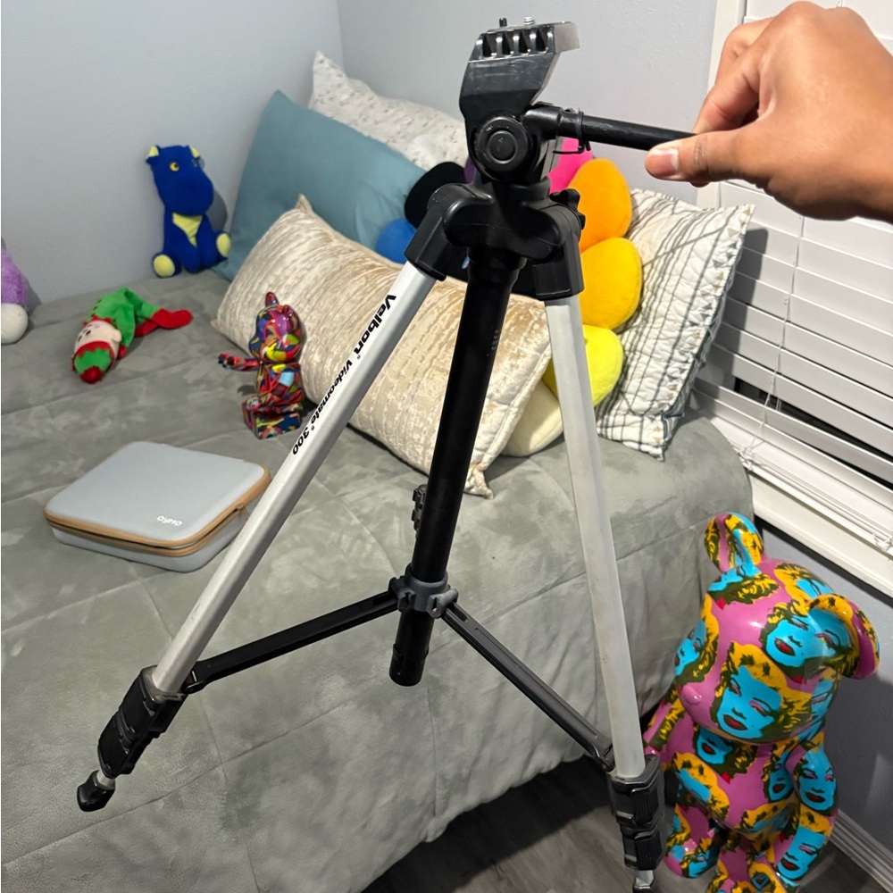 Versatile Black and Silver Tripod